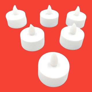 White LED candles on a red background