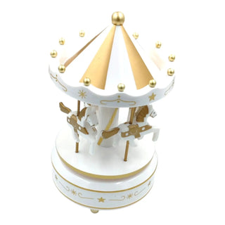 Decorative carousel with gold accents on a white background