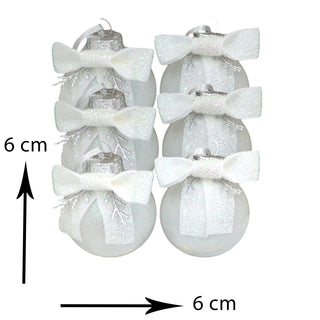Decorative Christmas balls with white bows and measurement details on a white background