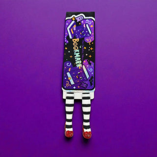 witchy bookmark with legs on a purple backdrop