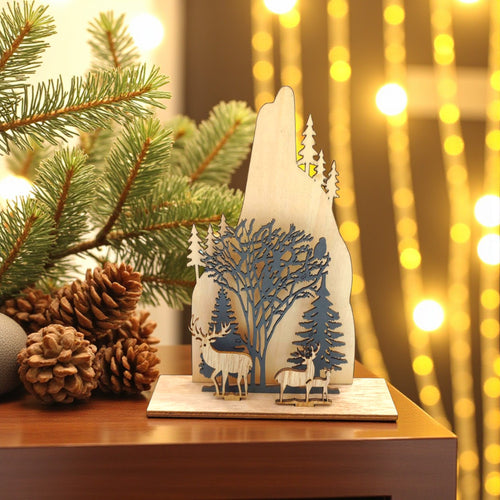 Decorative wooden piece with deer and trees on a table with Christmas decorations. Woodlands, Nordic Aesthetic