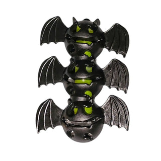Black and gray toy figure with bat wings on a white background