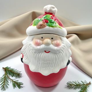Cute and charming Santa treat jar styled with Christmas décor, perfect for gifting and holiday kitchen styling inspiration.