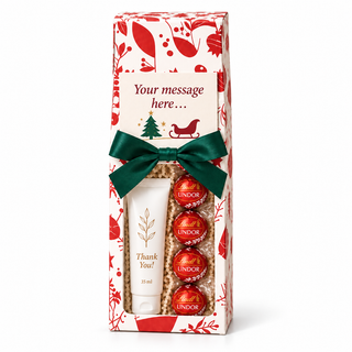 Corporate Christmas gift box with personalised hand cream and Lindt Lindor truffles in a red botanical gift carton