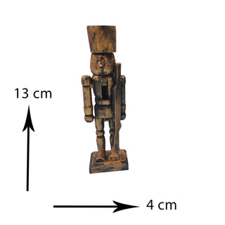 Wooden nutcracker figure with dimensions indicated on a white background