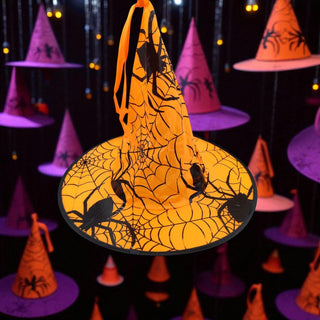 Halloween-themed decoration with witch hats and spider webs on a dark background