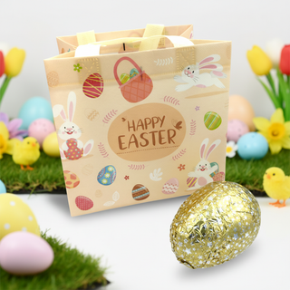 Easter-themed gift bag with decorative eggs and Easter decorations on a white background