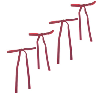Set of red satin ribbons on a white background