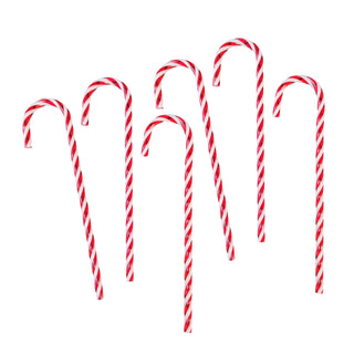 Red and white striped candy canes on a white background
