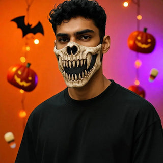 Person wearing a Halloween-themed skull mask with pumpkins and bats in the background