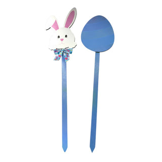 Decorative pick with a rabbit design and blue handle on a white background